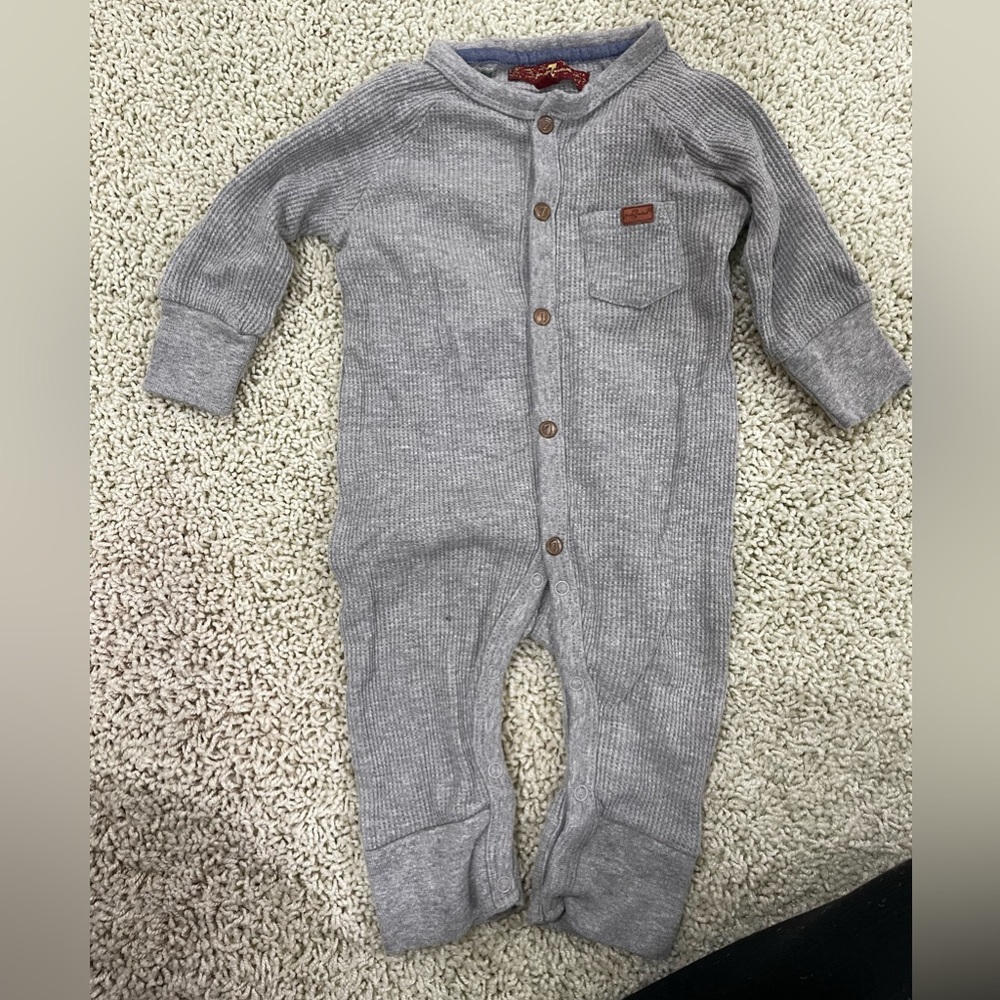 Seven onesie